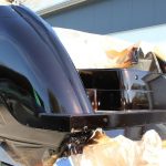 Heck einer Formula 40 PC Motoryacht mit Effektlack Bootslackierung in der Sonne auf dem Werftgelände der Bootswerft Baumgart in Dortmund