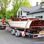 Rapsody 29 auf dem Bootstrailer auf dem Werftgelände der Bootswerft Baumgart nach durchgeführter Bootslackierung in Dortmund