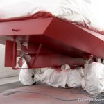 Bootslackierung beim Refit einer St. Jozef Vlet Motoryacht in der Lackierkabine der Bootswerft Baumgart in Dortmund