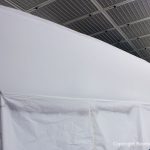 Grundierung des Rumpfes einer Comfortina 38 in der Lackierkabine der Bootswerft Baumgart in Dortmund