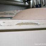 Jaguar 22 Segelkajütboot bei der Reparatur in der Werfthalle der Bootswerft Baumgart in Dortmund