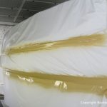 Lackierung einer NAB 32 Segelyacht in der Lackierkabine der Bootswerft Baumgart in Dortmund